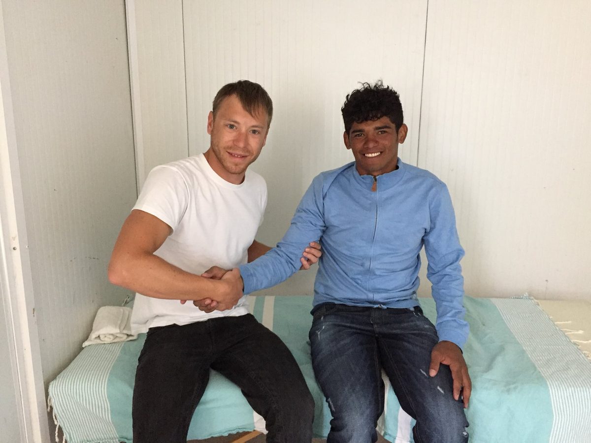 Timothee Reguigne, osteopath, with kiteboarding freestyle world champion Carlos Mario at the 2017 Mondial du Vent in Leucate
